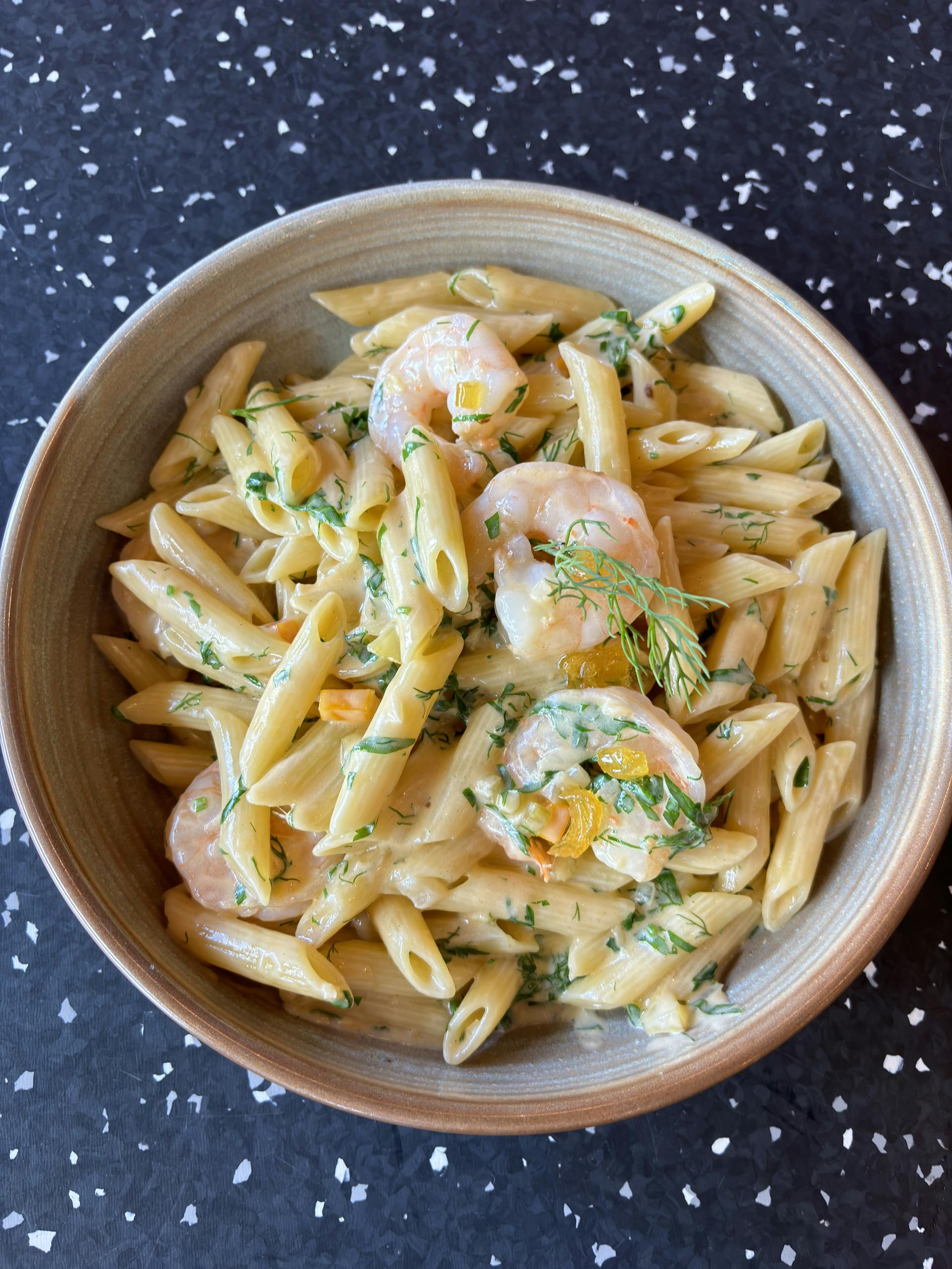 <p>Penne pasta, Shrimps Bisque, Shrimps, caramelised onions and dill</p>