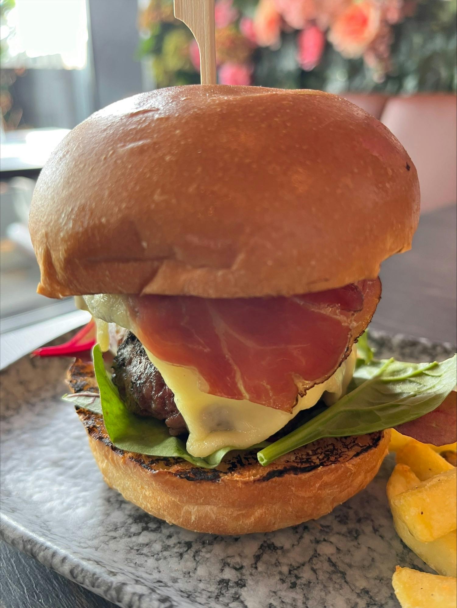 <p>Brioche bun, beef patty, speck, emmenthal cheese, salad and pickles mayo</p>